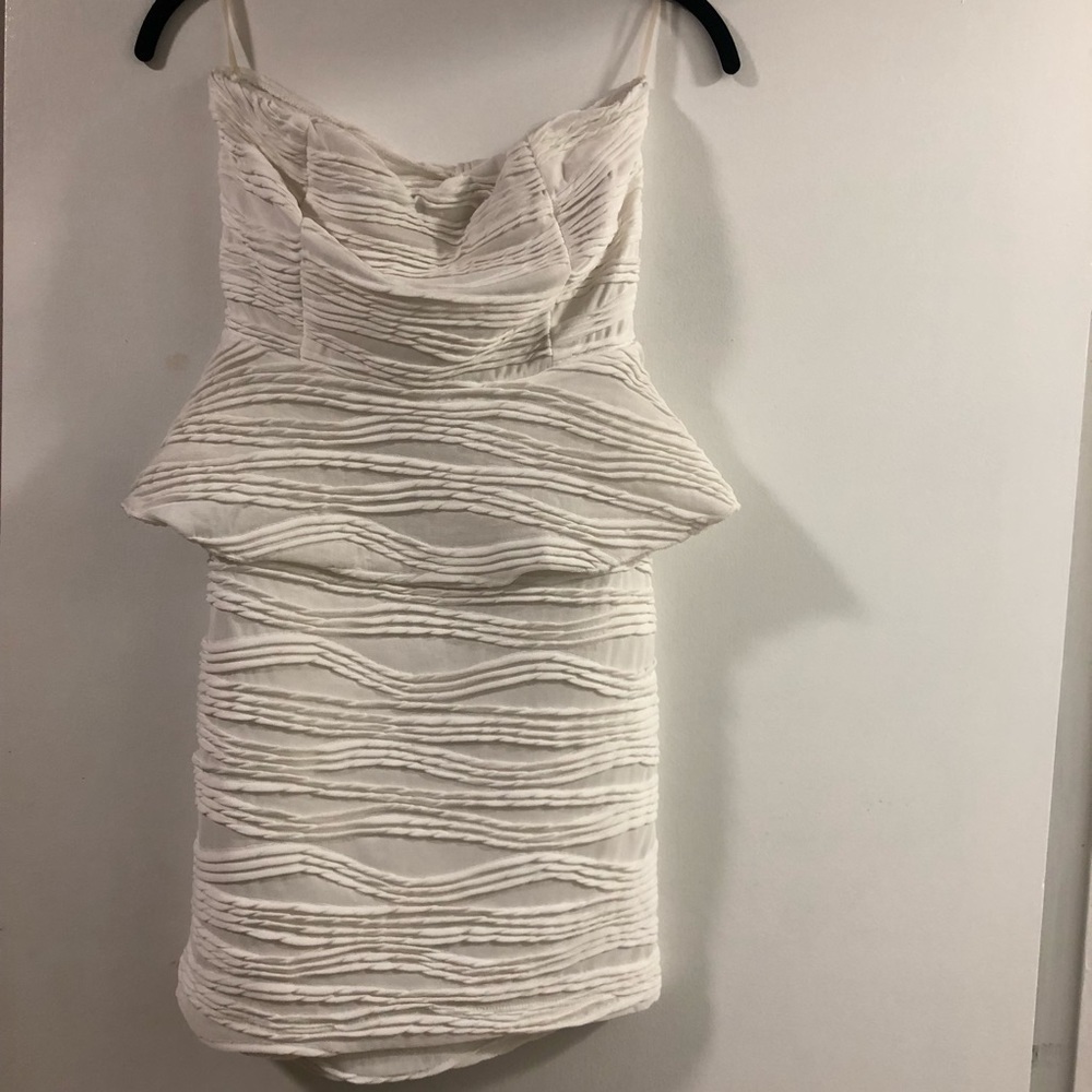 Strapless mini peplum dress